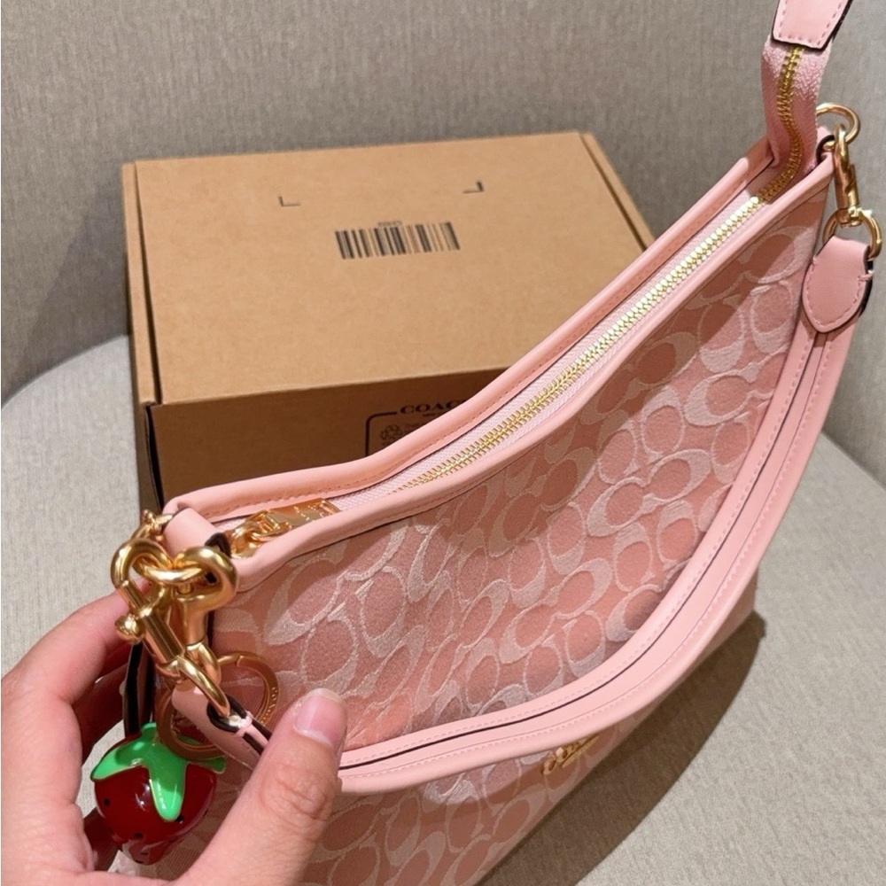 Coach Pink Signature Canvas Shoulder Bag with Strawberry Charm - Picture 7 of 9